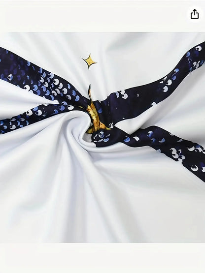 Close-up of the shiny color-block print detail on the girls' performance set
